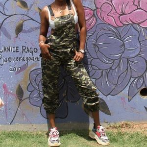 Army overalls with chain belt